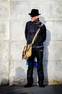 With a man bag by a wall_Garry Knight